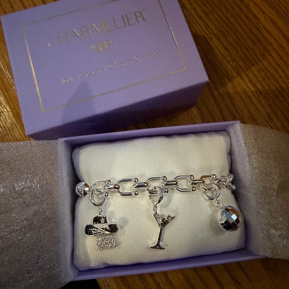 Charming Silver Bracelet with Unique Charms - Picture 1 of 2
